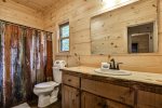 Communal bathroom with tub/shower combo